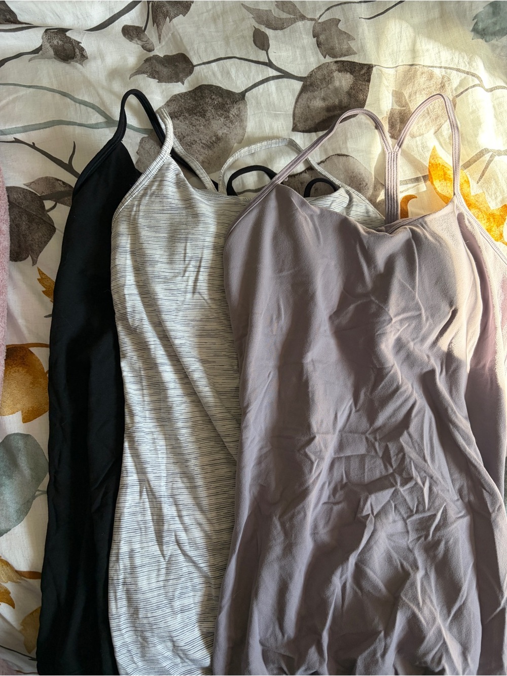3 Lululemon size 4 tanks, built in bras